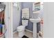 Small bathroom with pedestal sink and toilet at 350 E Park Ave, Lake Wales, FL 33853