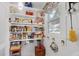 Well-stocked pantry with ample shelving for food storage at 350 E Park Ave, Lake Wales, FL 33853