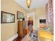 Charming home office featuring hardwood floors and built-in wooden cabinet at 350 E Park Ave, Lake Wales, FL 33853