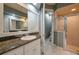 Clean bathroom with granite countertop, a shower and a toilet at 3017 Mission Lakes Dr, Lakeland, FL 33803