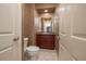 Small half bathroom with toilet and sink at 3017 Mission Lakes Dr, Lakeland, FL 33803
