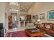 Open living room and kitchen with high ceilings and area rug at 3017 Mission Lakes Dr, Lakeland, FL 33803