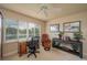 Home office featuring comfortable seating, a desk, and a large window at 3017 Mission Lakes Dr, Lakeland, FL 33803
