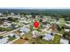 Aerial view showing home's location in residential neighborhood at 404 Thomas Ave, Frostproof, FL 33843