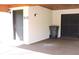 Gray house entrance door and trash can at 5016 Washington St, Lake Wales, FL 33859