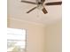 Bedroom with tile floors, window, and ceiling fan at 5016 Washington St, Lake Wales, FL 33859