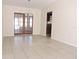 Dining room with tile floors and French doors to patio at 5016 Washington St, Lake Wales, FL 33859