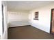 Screened porch with built-in shelving and window at 5016 Washington St, Lake Wales, FL 33859