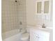 Clean bathroom with white vanity and tile shower at 5016 Washington St, Lake Wales, FL 33859