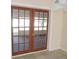 French doors leading to a screened porch at 5016 Washington St, Lake Wales, FL 33859