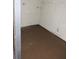Unfinished laundry room with plumbing and shelving at 5016 Washington St, Lake Wales, FL 33859