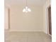 Dining room with tile floors and a chandelier at 5016 Washington St, Lake Wales, FL 33859