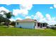 Back of house, showing the screened patio at 914 Oxford Way, Lake Wales, FL 33853