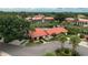 Aerial view of a community clubhouse near a lake at 8203 Village Dr # 8203, Lake Wales, FL 33898
