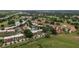 Aerial view showing property location in a golf course community at 8203 Village Dr # 8203, Lake Wales, FL 33898