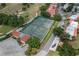 Two tennis courts with a nearby clubhouse at 8203 Village Dr # 8203, Lake Wales, FL 33898