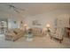 Living room with two sofas, coffee table, and comfortable armchair at 8203 Village Dr # 8203, Lake Wales, FL 33898