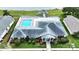 Community pool and clubhouse aerial view at 231 Lake Suzanne Dr, Lake Wales, FL 33859