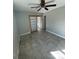 Bright bedroom with ceiling fan and built-in shelving at 1815 Moose Dr, Lakeland, FL 33801