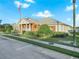 Community building exterior, nicely landscaped at 341 Lake Suzanne Dr, Lake Wales, FL 33859