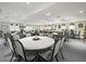 Spacious community room with tables and chairs, ideal for gatherings at 341 Lake Suzanne Dr, Lake Wales, FL 33859