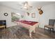 Game room featuring a pool table and wood flooring at 341 Lake Suzanne Dr, Lake Wales, FL 33859