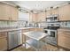Modern kitchen featuring stainless steel appliances and ample counter space at 341 Lake Suzanne Dr, Lake Wales, FL 33859