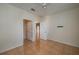 Spacious bedroom with wood-look tile flooring and ceiling fan at 5011 Hemingway Cir # 5011, Haines City, FL 33844