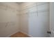 Walk-in closet with built-in shelving at 5011 Hemingway Cir # 5011, Haines City, FL 33844