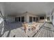 Deck area with tables, chairs, and surrounding windows at 5011 Hemingway Cir # 5011, Haines City, FL 33844