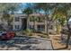 View of the apartment buildings with stairs, balconies, and parking at 5011 Hemingway Cir # 5011, Haines City, FL 33844