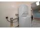 Convenient in-unit laundry area with a stacked washer and dryer at 5011 Hemingway Cir # 5011, Haines City, FL 33844