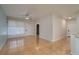 Bright living room with wood-look tile floors and a ceiling fan at 5011 Hemingway Cir # 5011, Haines City, FL 33844