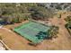 Community tennis courts with a playground nearby at 5011 Hemingway Cir # 5011, Haines City, FL 33844