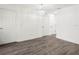 Bright hallway with hardwood floors and white doors at 815 S Seminole Ave, Fort Meade, FL 33841