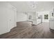 Modern white kitchen with an island and stainless steel appliances at 815 S Seminole Ave, Fort Meade, FL 33841