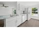 Modern kitchen with stainless steel appliances and granite countertops at 815 S Seminole Ave, Fort Meade, FL 33841