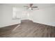 Open concept living area with hardwood floors and neutral color palette at 815 S Seminole Ave, Fort Meade, FL 33841