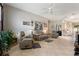 Living room with tile flooring, neutral color scheme, and comfortable seating at 337 Motorcoach S Dr, Polk City, FL 33868