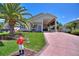 Cute one-story house with covered parking and landscaped yard at 337 Motorcoach S Dr, Polk City, FL 33868