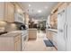 Bright kitchen features light wood cabinets, ample counter space, and modern appliances at 337 Motorcoach S Dr, Polk City, FL 33868