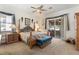 Main bedroom with a king-size bed and access to a private patio at 337 Motorcoach S Dr, Polk City, FL 33868
