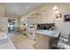 Kitchen boasting light wood cabinets, a breakfast nook, and modern appliances at 337 Motorcoach S Dr, Polk City, FL 33868