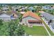 Aerial view of a house with a large backyard and surrounding neighborhood at 337 Motorcoach S Dr, Polk City, FL 33868