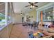 Spacious screened porch, perfect for relaxing or entertaining, with multiple ceiling fans at 337 Motorcoach S Dr, Polk City, FL 33868