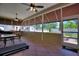 Relaxing screened porch with ample space for seating and outdoor enjoyment at 337 Motorcoach S Dr, Polk City, FL 33868