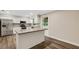 Modern kitchen featuring stainless steel appliances and granite countertops at 7510 Catherine Dr, Lakeland, FL 33810