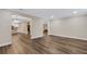 Open living room, kitchen, and fireplace views at 7510 Catherine Dr, Lakeland, FL 33810