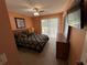 Bedroom with a queen-size bed and private balcony access at 8425 Crystal Cove Loop, Kissimmee, FL 34747