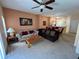 Open living room and kitchen layout with a dining area at 8425 Crystal Cove Loop, Kissimmee, FL 34747